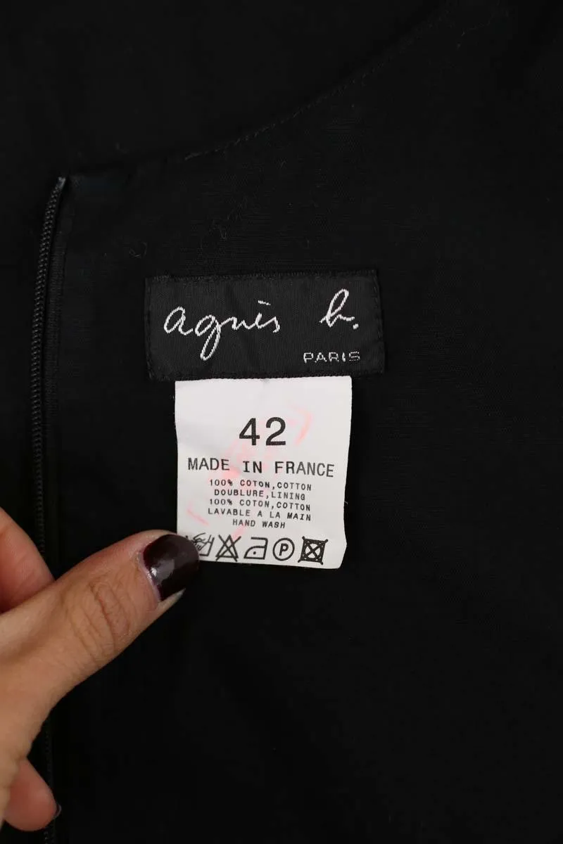 Robe de seconde main Agnès B. en coton noir pour femme, taille 42, longueur 108cm, en très bon état.